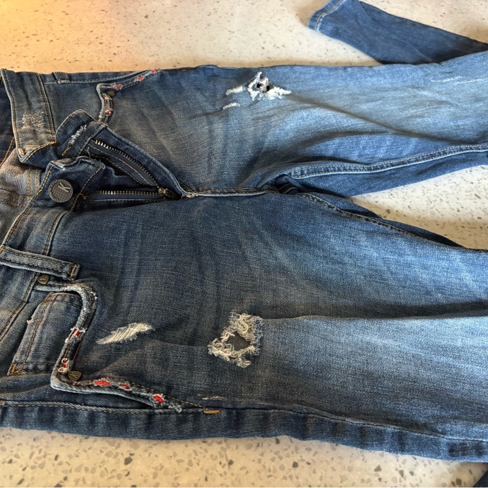 Distressed Blue Jeans